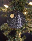 Winter Theme Wood Ornament 2025 - 39 - Star Trails, Snowy Tree and Gold Moon