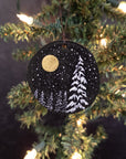 Winter Theme Wood Ornament 2025 - 55 - Snowy Tree and Forest with Gold Moon