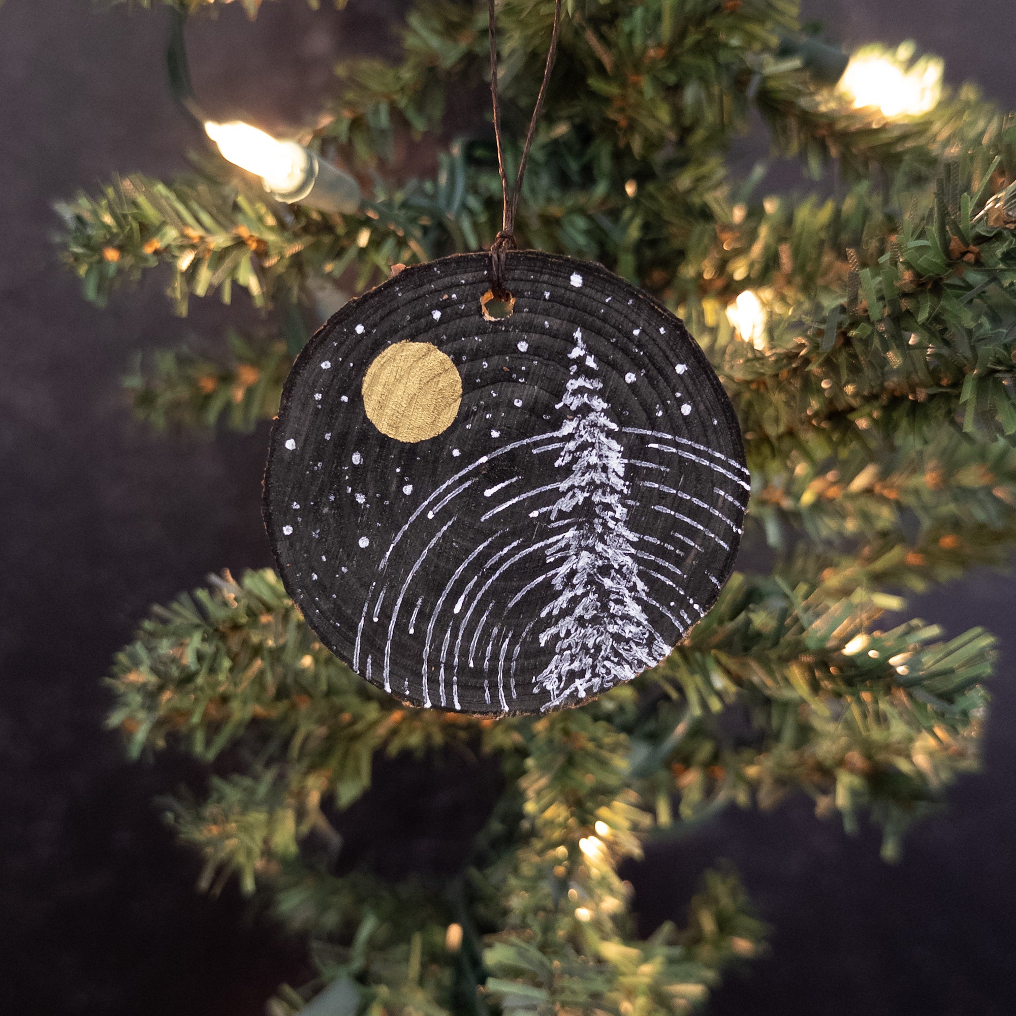 Winter Theme Wood Ornament 2025 - 39 - Star Trails, Snowy Tree and Gold Moon